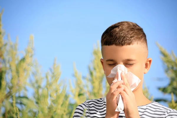 Little boy suffering from ragweed allergy outdoors — Stock Photo, Image