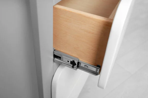 Open chest of drawers indoors, closeup view