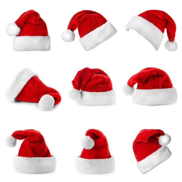 Set di cappelli Babbo Natale rossi su sfondo bianco — Foto Stock