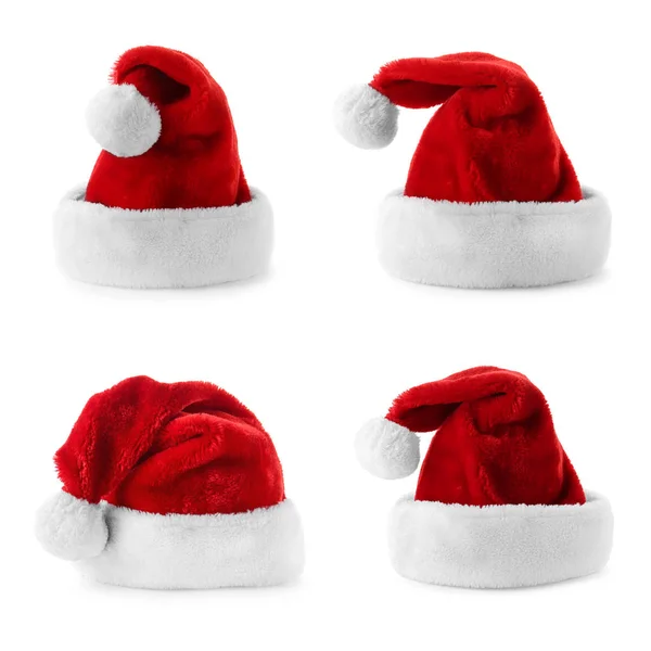 Conjunto de chapéus vermelhos Papai Noel no fundo branco — Fotografia de Stock