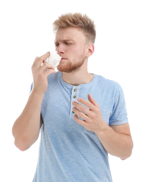 Νέος άνθρωπος που πάσχει από αλλεργία σε λευκό φόντο — Φωτογραφία Αρχείου