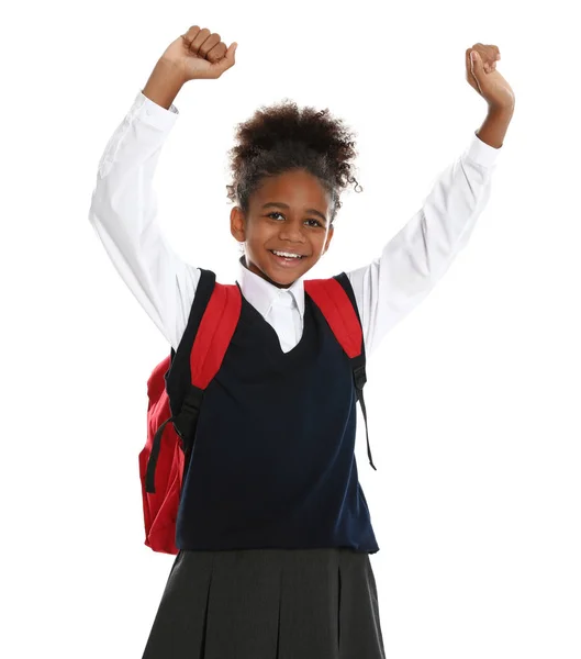 Menina afro-americana feliz em uniforme escolar no fundo branco — Fotografia de Stock