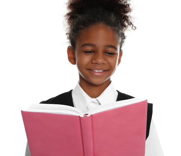 stock image Happy African-American girl in school uniform reading book on white background