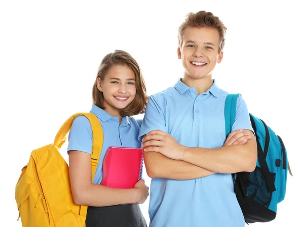 Happy pupils in school uniform on white background Stock Image