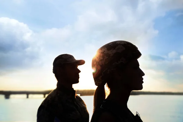 Soldiers in uniform patrolling outdoors. Military service — Stock Photo, Image