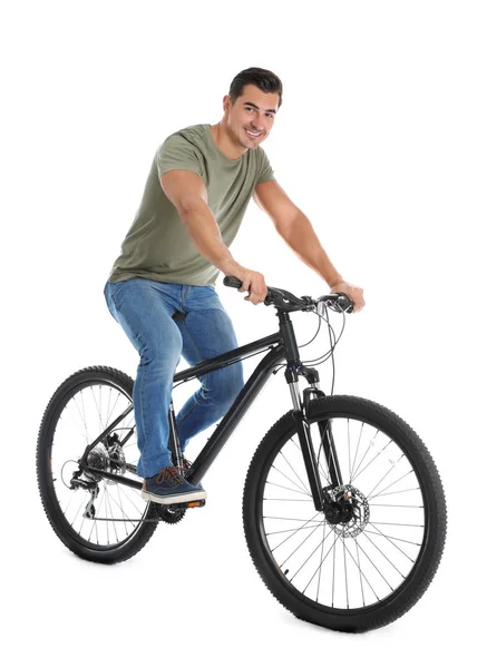 Schöner junger Mann mit modernem Fahrrad auf weißem Hintergrund — Stockfoto