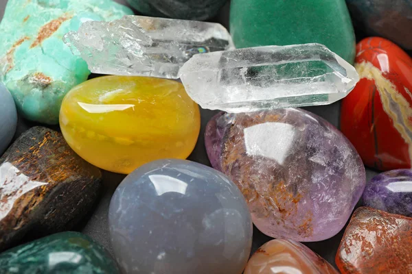 Different precious gemstones as background, closeup view — Stock Photo, Image