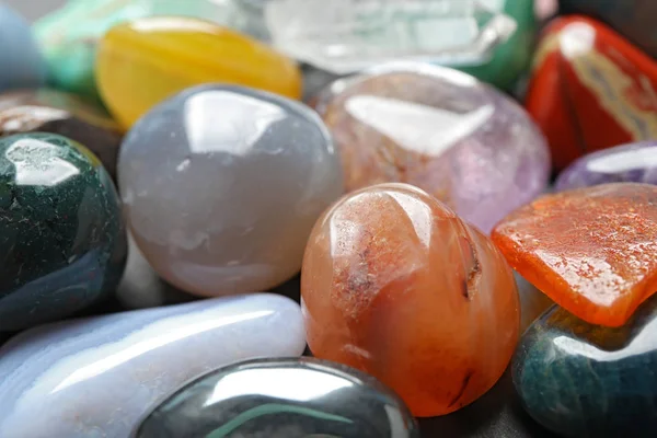 Different precious gemstones as background, closeup view — Stock Photo, Image