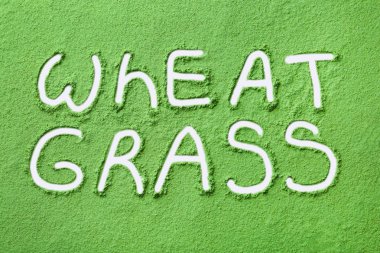 Kelimeler Buğday Çim toz üzerine yazılmış, üst görünümü