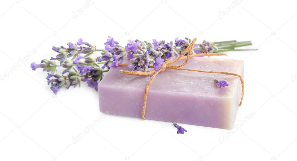 Hand made soap bar with lavender flowers on white background