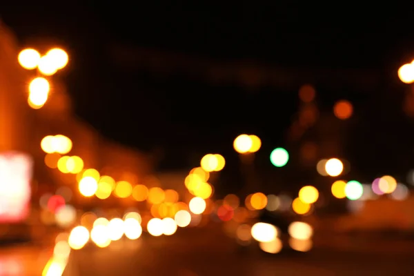 Onscherp uitzicht op de prachtige stad 's nachts. Bokeh-effect — Stockfoto