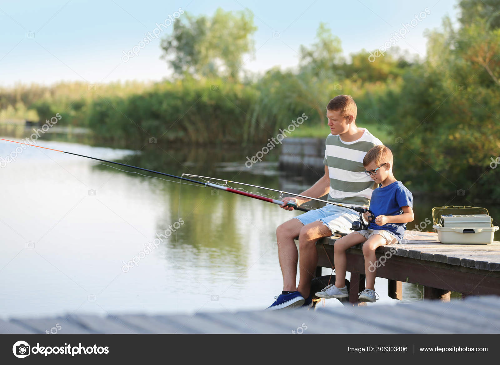 https://st4.depositphotos.com/16122460/30630/i/1600/depositphotos_306303406-stock-photo-dad-and-son-fishing-together.jpg