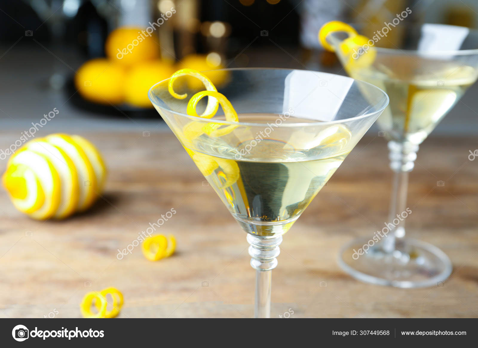 https://st4.depositphotos.com/16122460/30744/i/1600/depositphotos_307449568-stock-photo-glass-of-lemon-drop-martini.jpg