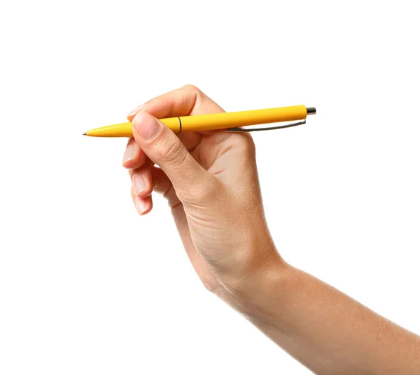 Jeune femme tenant un stylo sur fond blanc, gros plan — Photo