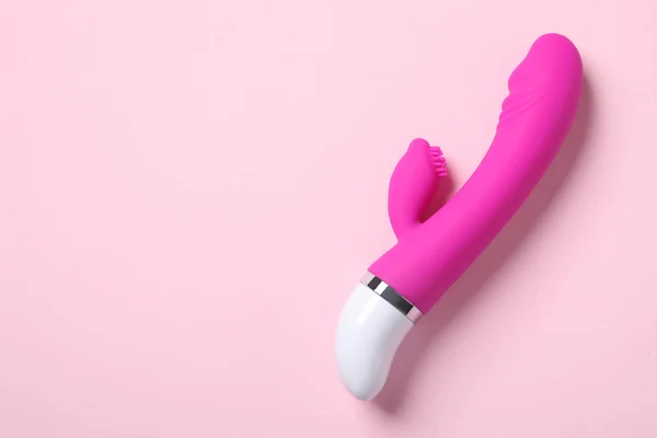 Vibrator on pink background, top view with space for text. Sex toy — Stock Photo, Image