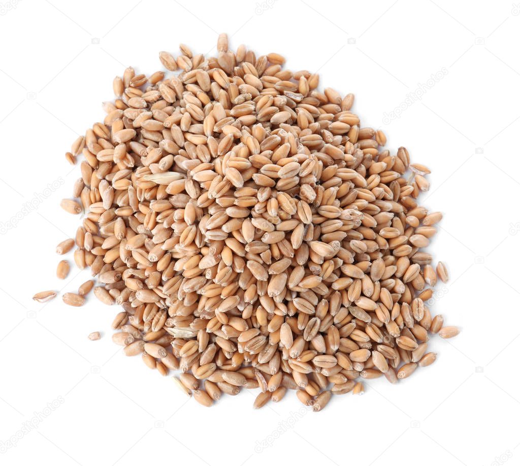 Pile of wheat grains on white background, top view. Cereal crop