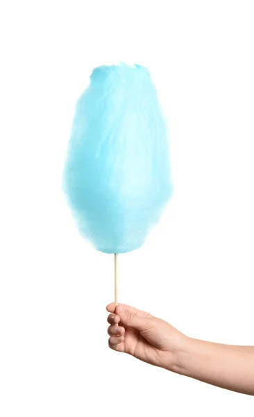 Woman holding sweet blue cotton candy on white background, closeup view — Stock Photo, Image