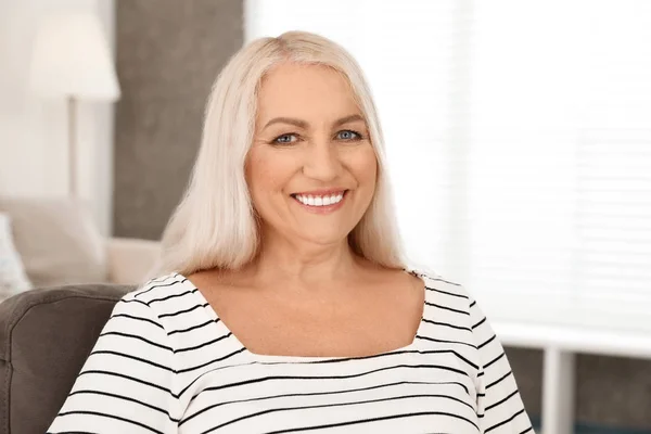 Portrait of mature woman with beautiful face indoors — Stock Photo, Image