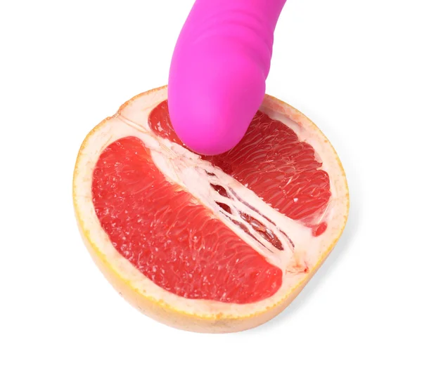 stock image Half of grapefruit and purple vibrator on white background. Sex concept