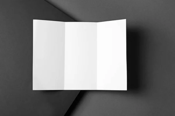 Empty flyer on dark background. Mockup for design — Stock Photo, Image