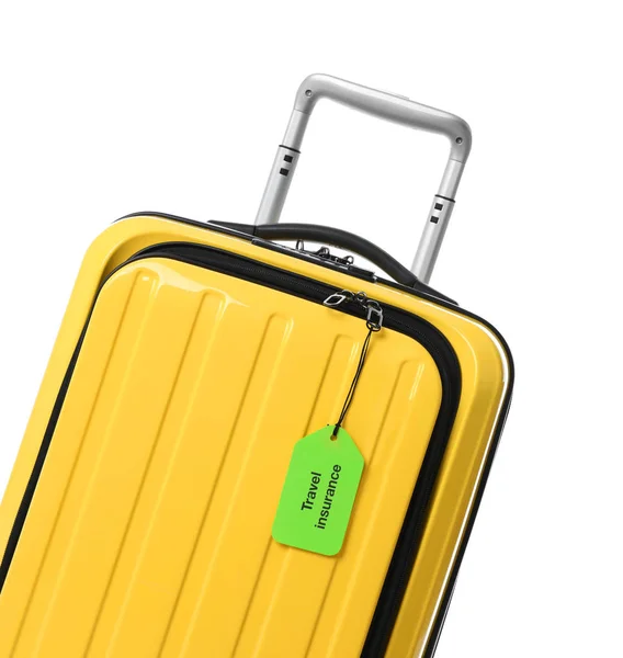 Yellow suitcase with TRAVEL INSURANCE label on white background — Stock Photo, Image
