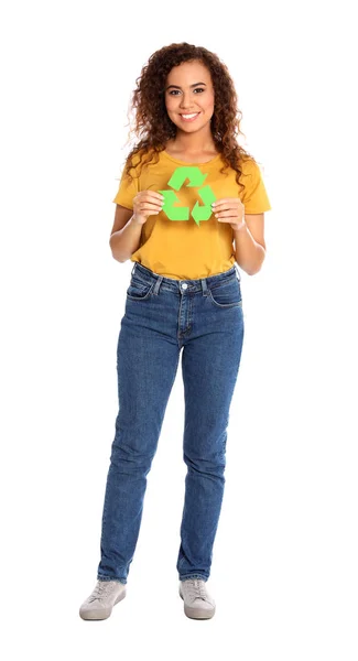 Young African-American woman with recycling symbol on white background — Stock Photo, Image