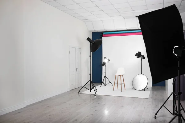 Photo studio interior with set of professional equipment — Stock Photo, Image