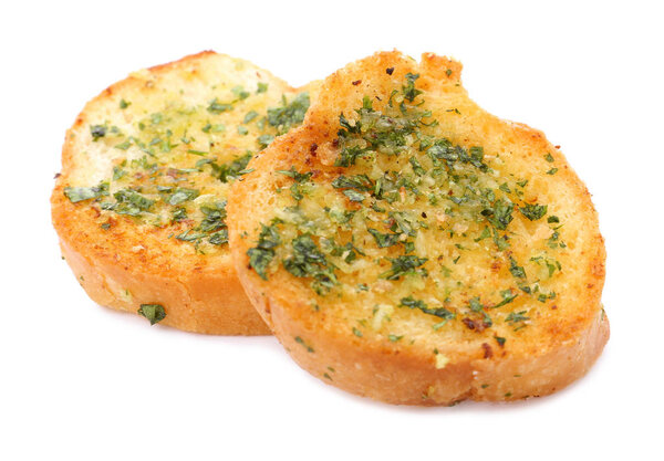 Slices of toasted bread with garlic, cheese and herbs on white background