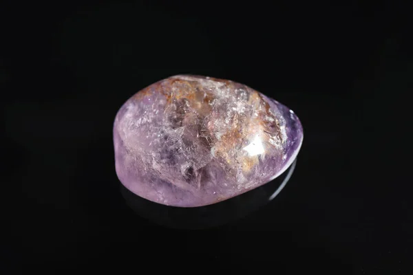 Beautiful light purple ametryn gemstone on black background — Stock Photo, Image