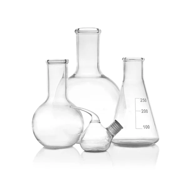 Set of empty laboratory glassware on white background — Stock Photo, Image