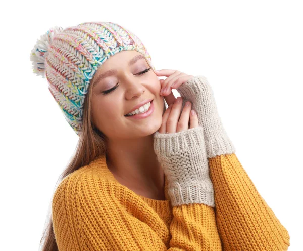 Young woman in warm sweater, mittens and hat on white background. Winter season — Stock Photo, Image