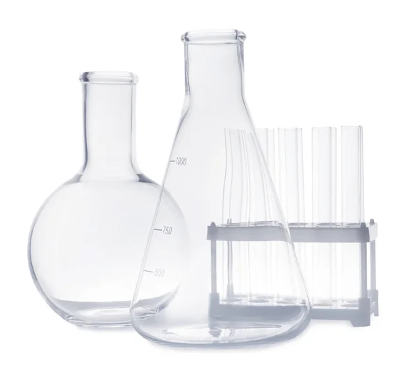 Set of empty laboratory glassware on white background — Stock Photo, Image