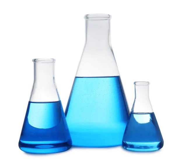 Conical flasks with blue liquid on white background. Laboratory glassware — Stock Photo, Image