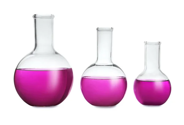 Florence flasks with purple liquid on white background — Stock Photo, Image