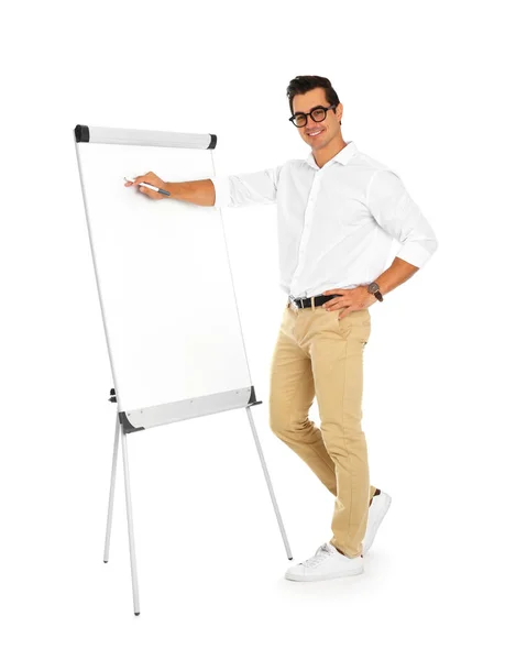 Treinador de negócios profissional perto de flip chart no fundo branco — Fotografia de Stock