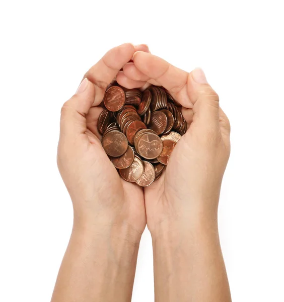 Mujer joven sosteniendo monedas sobre fondo blanco, vista superior — Foto de Stock