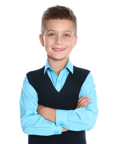 Niño feliz en uniforme escolar sobre fondo blanco —  Fotos de Stock