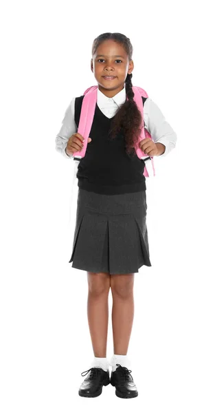 Gelukkig Afrikaans-Amerikaans meisje in school uniform op witte achtergrond — Stockfoto