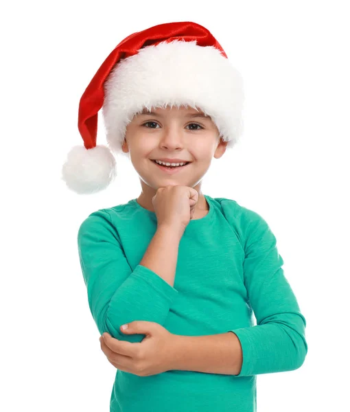 Aranyos kis gyerek, Télapó kalapot visel fehér háttéren. Karácsonyi szünet — Stock Fotó