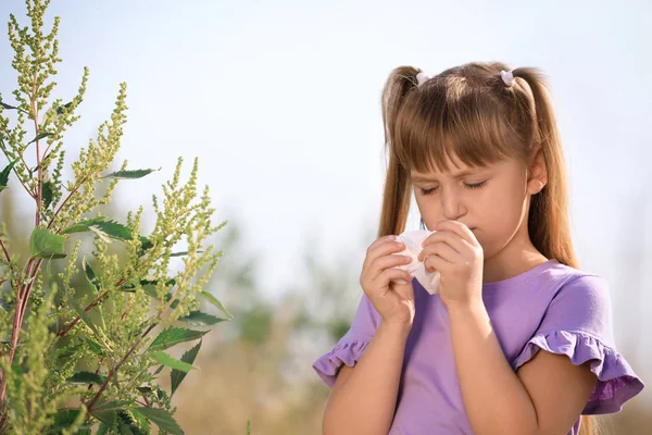 Little girl suffering from ragweed allergy outdoors — Stock Photo, Image