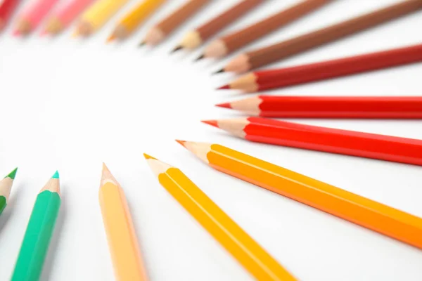 Composition with color pencils on white background — Stock Photo, Image