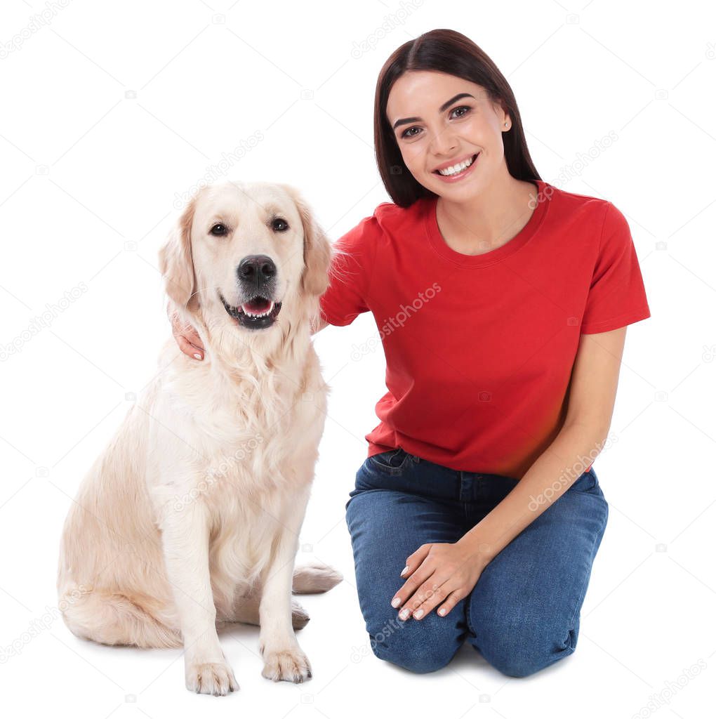 Young woman and her Golden Retriever dog on white background