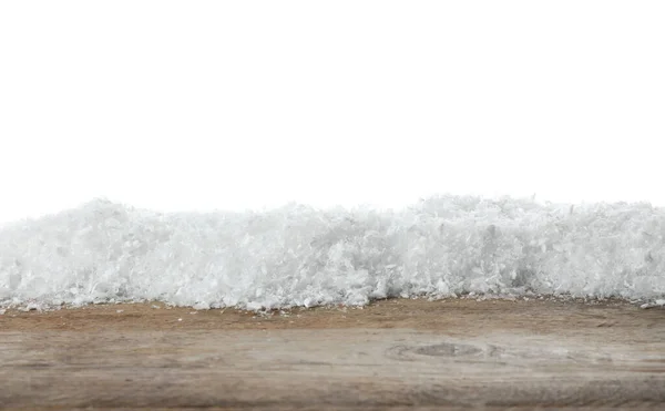 Montón de nieve en la superficie de madera sobre fondo blanco. Temporada de Navidad —  Fotos de Stock