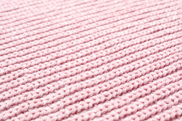 Рожевий зимовий светр як фон, вид крупним планом — стокове фото