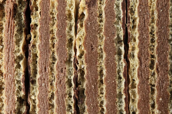 Vista de perto de palitos de wafer saborosos como fundo. Comida doce — Fotografia de Stock