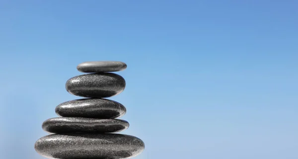 Stack of stones against blue sky, space for text. Zen concept — Stock Photo, Image