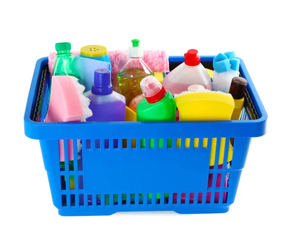 Cesta llena de detergentes sobre fondo blanco — Foto de Stock