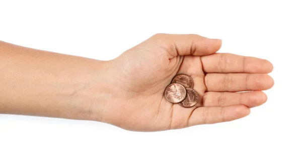 Young woman holding coins on white background, top view — Stock Photo, Image