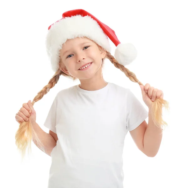 Criança bonita usando chapéu de Papai Noel no fundo branco. Natal feriado — Fotografia de Stock