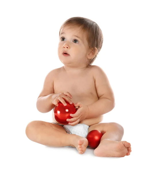 Mignon petit bébé avec des décorations de Noël sur fond blanc — Photo